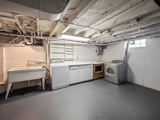 basement with sink and independent washer and dryer