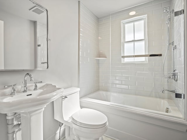 full bath with toilet, bathtub / shower combination, and visible vents