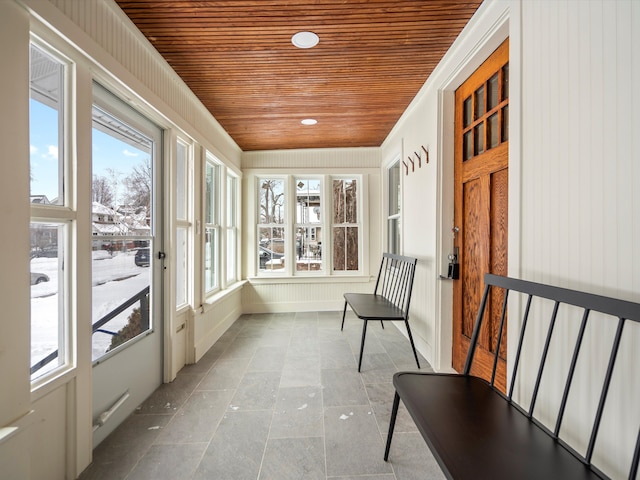 sunroom with wood ceiling