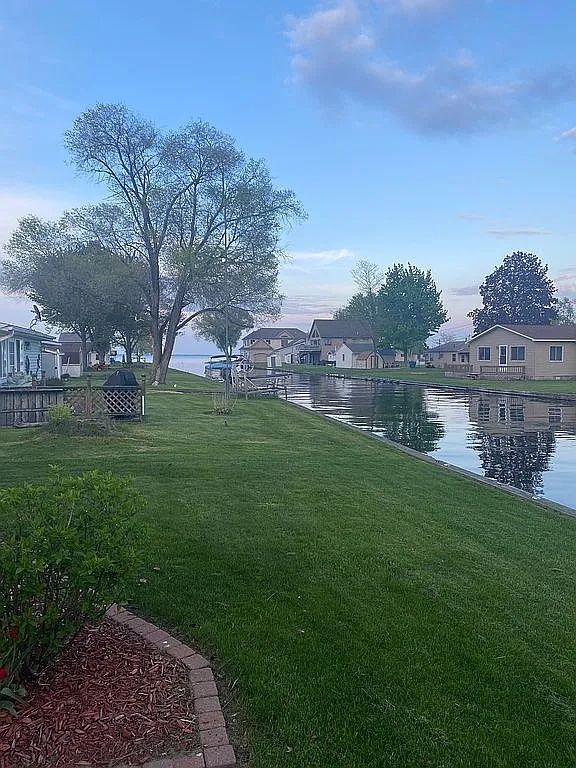 view of yard with a water view