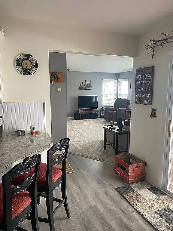 dining area featuring hardwood / wood-style floors