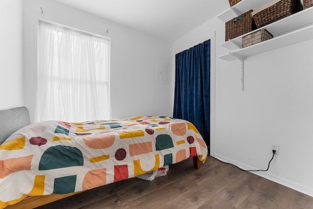 bedroom featuring wood finished floors