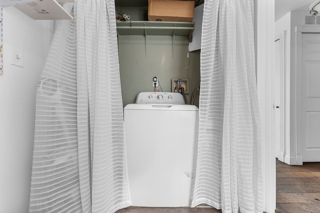 washroom with washer / dryer, laundry area, visible vents, and wood finished floors