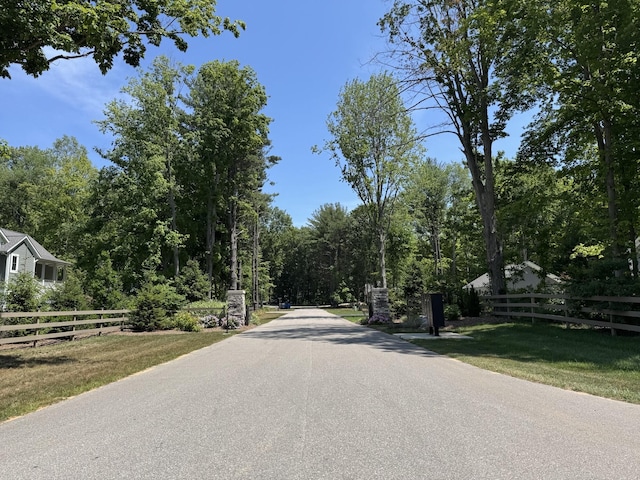 76831 Wood Crest Ct, South Haven, MI 49090 - view of asphalt road with a forest view