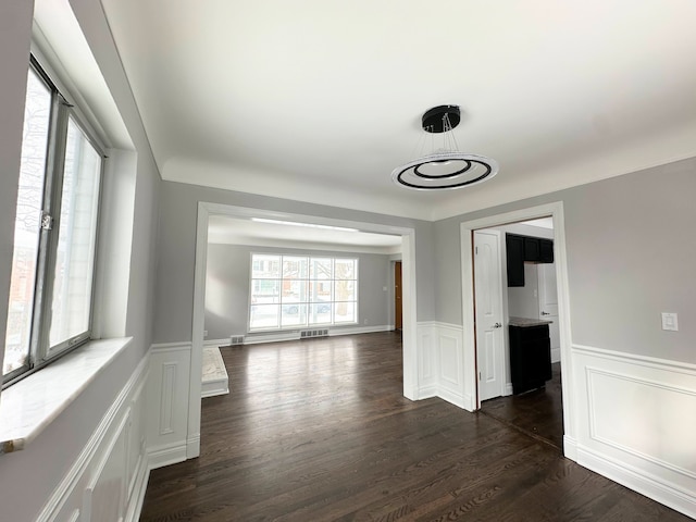 empty room featuring dark hardwood / wood-style floors