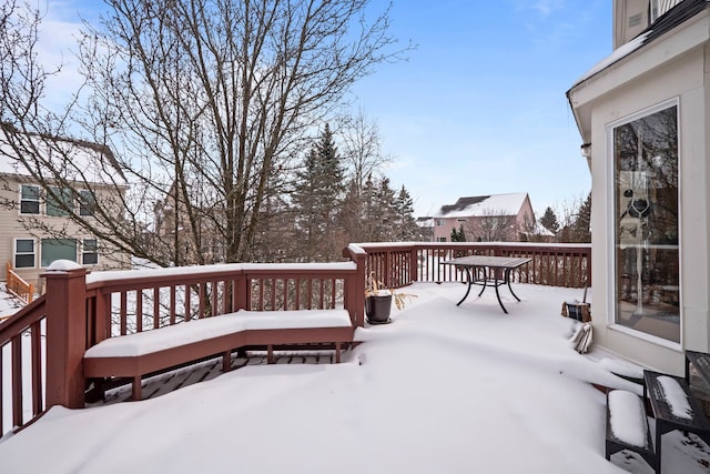 view of snow covered deck