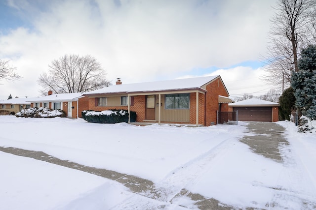 ranch-style home with a garage