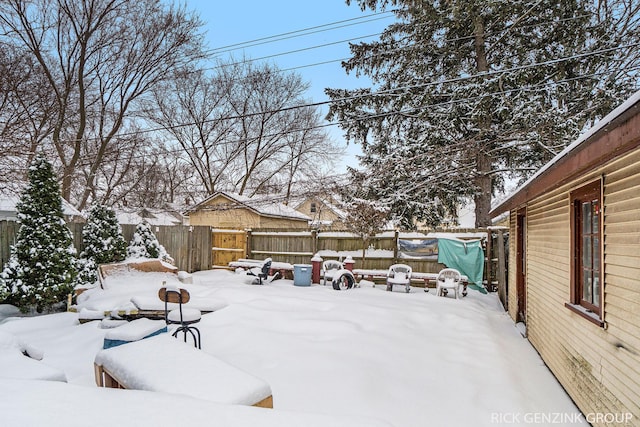 view of yard covered in snow