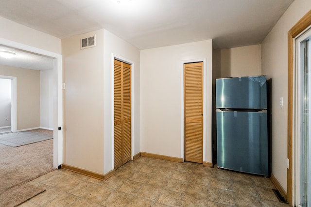 kitchen featuring stainless steel fridge