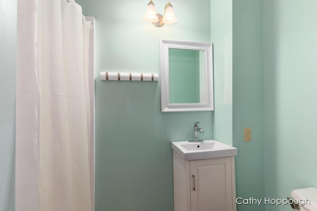 bathroom with vanity and toilet