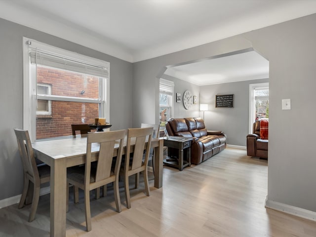 dining area with light wood-type flooring