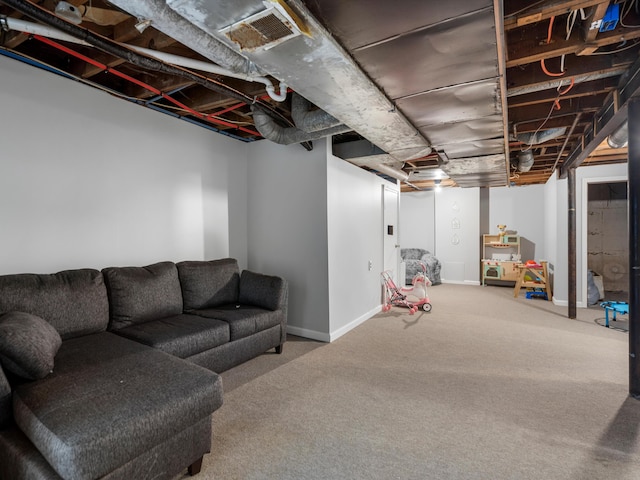 basement featuring carpet flooring