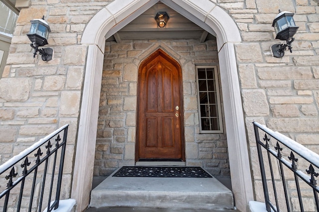 6705 College Park, Clarkston, MI 48346 - property entrance featuring stone siding