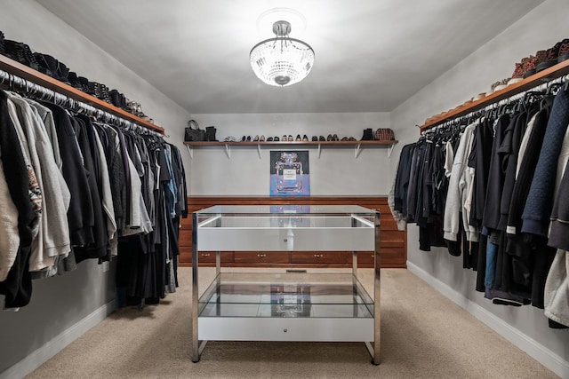 6705 College Park, Clarkston, MI 48346 - spacious closet with carpet floors and a notable chandelier