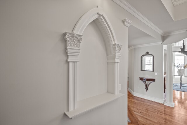 6705 College Park, Clarkston, MI 48346 - interior space featuring crown molding, wood finished floors, decorative columns, and baseboards