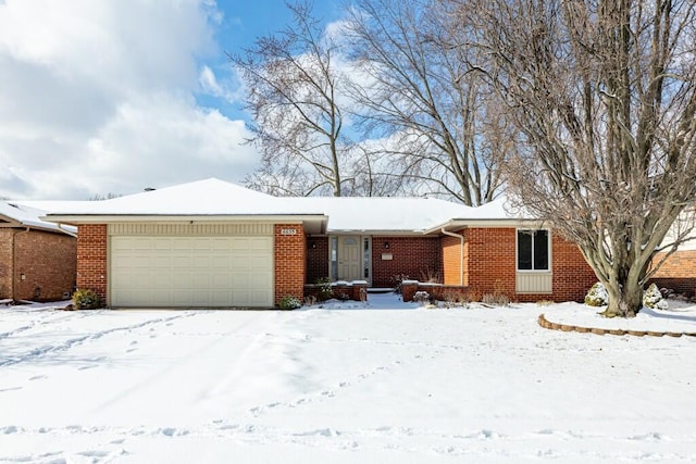 single story home featuring a garage