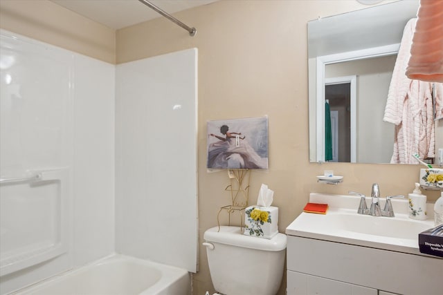 bathroom with toilet, vanity, and shower / bathing tub combination