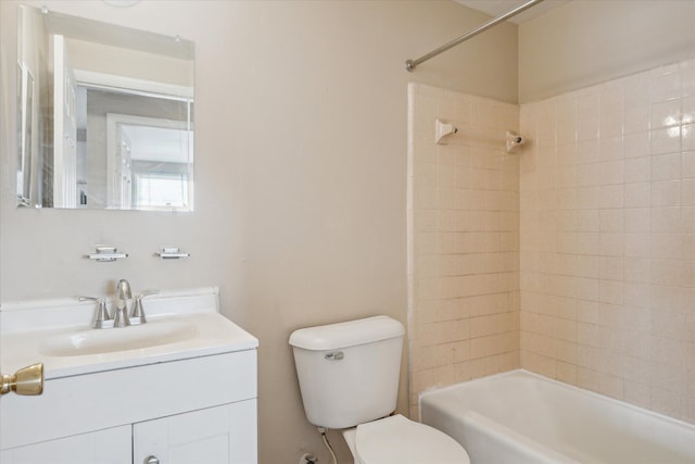 full bath featuring tub / shower combination, vanity, and toilet