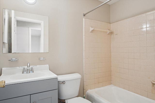 bathroom with toilet, shower / bathtub combination, and vanity