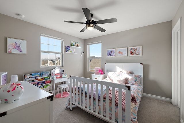 carpeted bedroom with ceiling fan