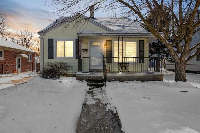 bungalow-style house with covered porch