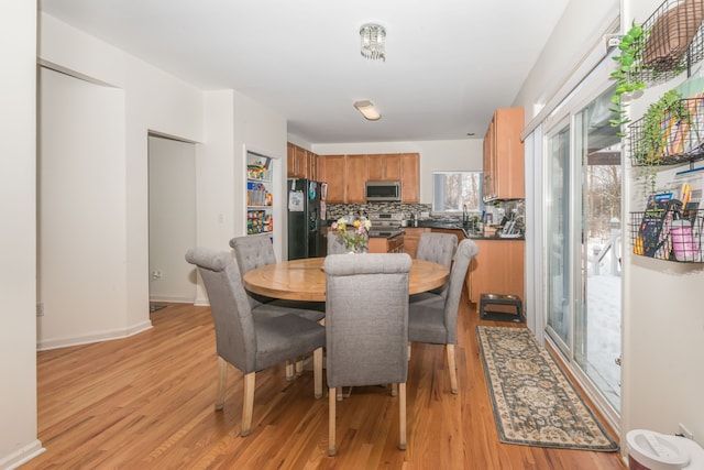 dining room featuring light hardwood / wood-style flooring