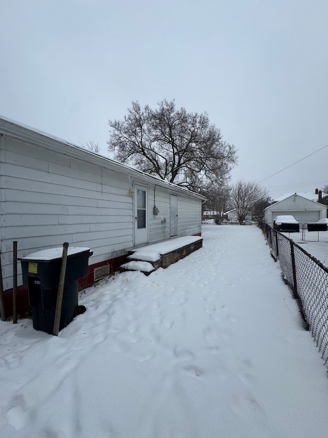 view of snow covered house