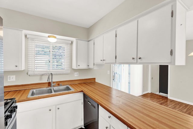 kitchen with white cabinetry, gas range oven, sink, dishwasher, and wood-type flooring