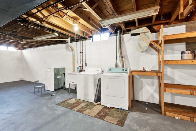 washroom featuring washer and dryer and sink