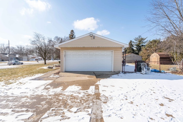 view of snow covered garage