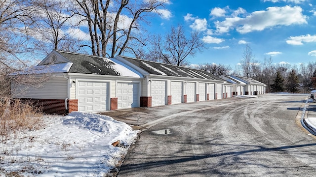 view of snow covered garage