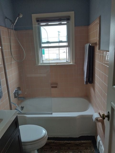 22673 Garrison St Unit 208, Dearborn, MI 48124 - bathroom with toilet, shower / bathing tub combination, and vanity