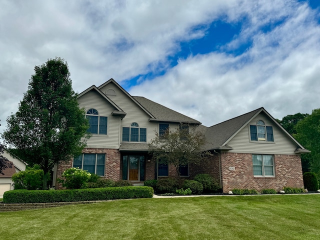 view of front of home with a front yard