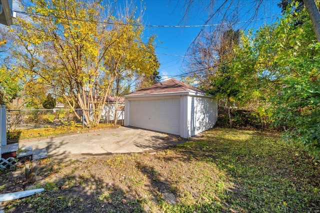 garage with a lawn