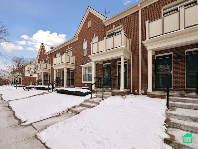 view of snow covered property