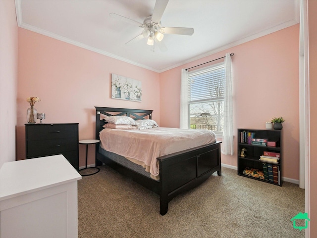 carpeted bedroom with ceiling fan and ornamental molding