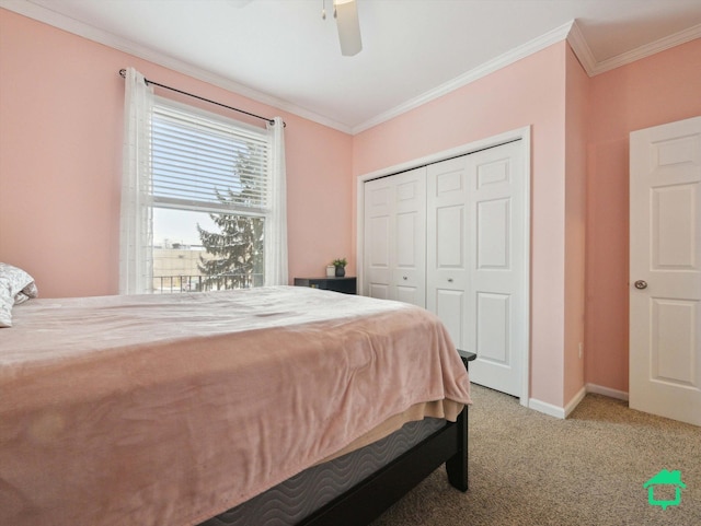 bedroom with light carpet, ceiling fan, a closet, and crown molding