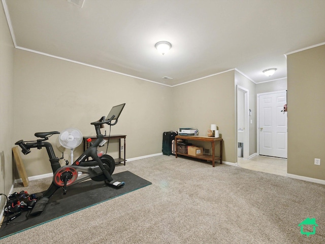 workout area with light carpet and crown molding