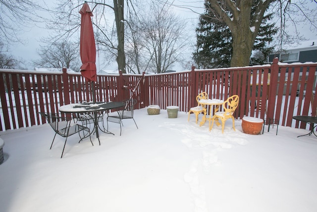 view of snow covered deck