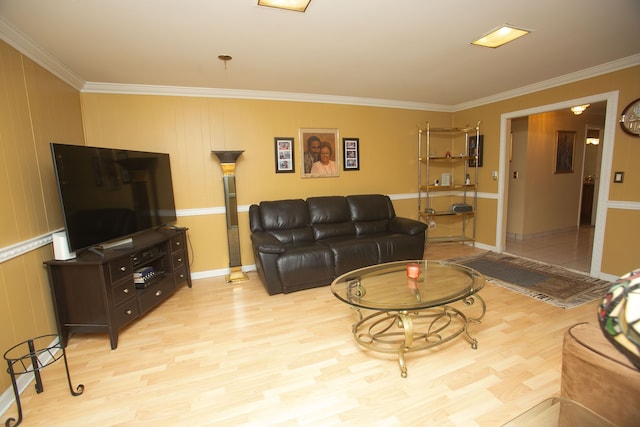 living area with light wood finished floors and crown molding