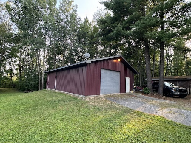 garage with a lawn