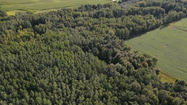 birds eye view of property featuring a rural view