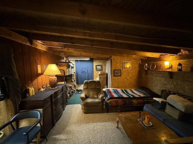 home theater room with carpet floors and beam ceiling