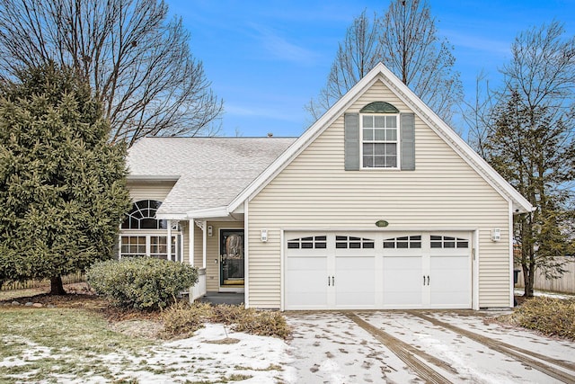 view of front of property with a garage