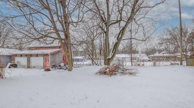 view of yard covered in snow