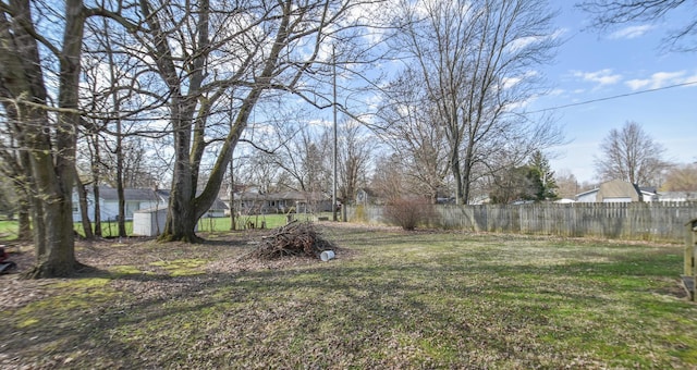 view of yard with fence