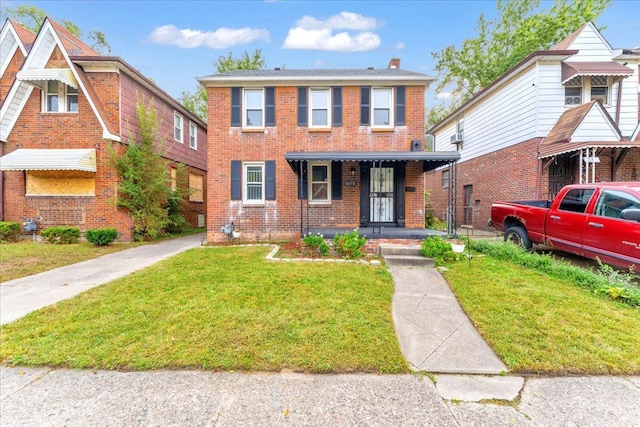 view of front of property featuring a porch and a front yard