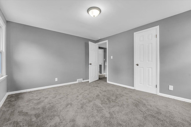 unfurnished bedroom featuring carpet floors