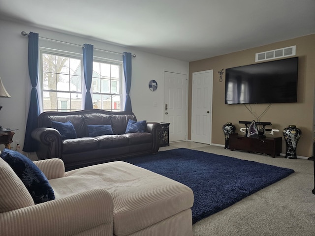 carpeted living room with visible vents