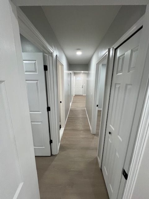 hall featuring light hardwood / wood-style flooring